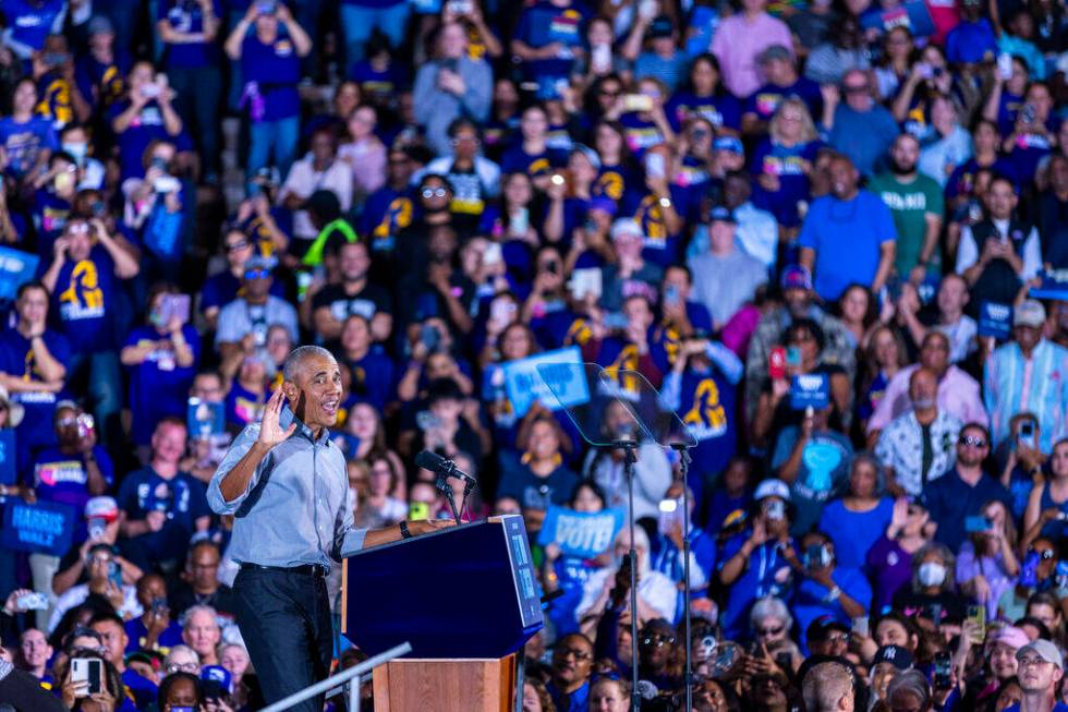 Former President Barack Obama speaks on behalf of the Harris-Walz campaign at Cheyenne High Sch ...