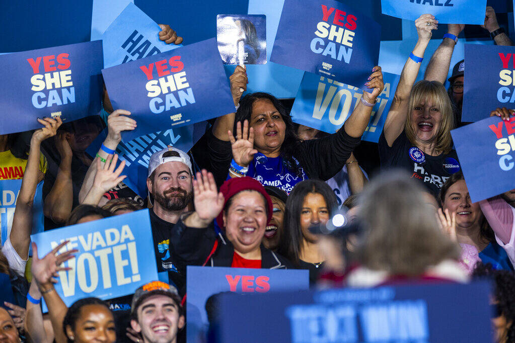 The crowd waves to Congresswoman Dina Titus before Former President Barack Obama speaks on beha ...