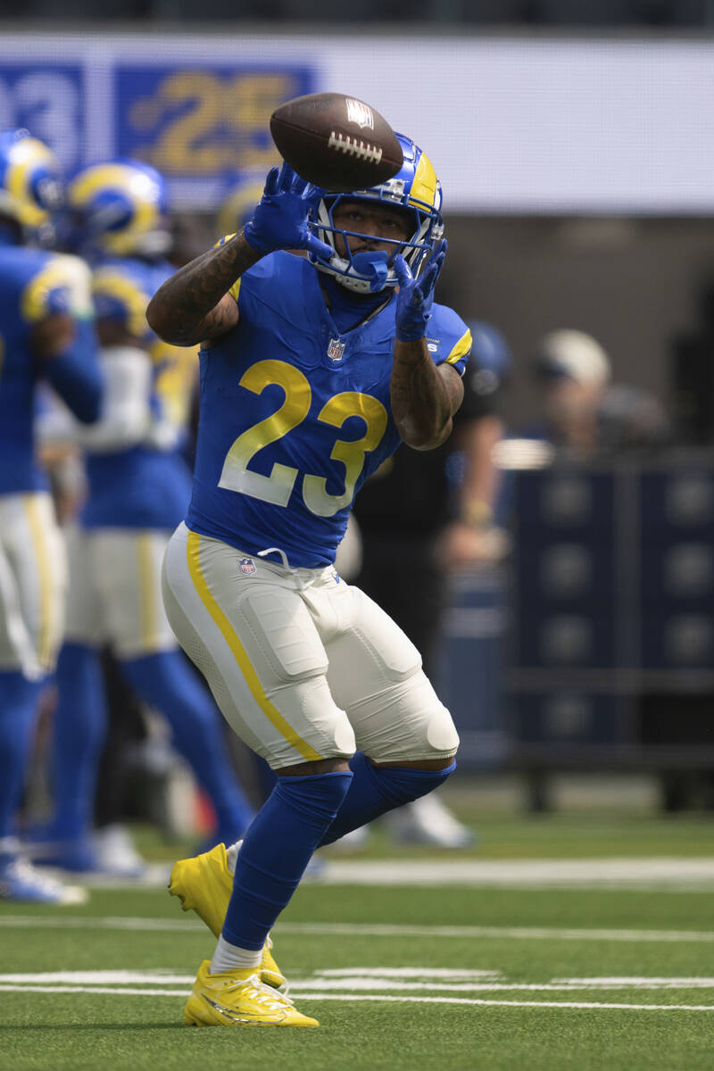 Los Angeles Rams running back Kyren Williams (23) catches the ball before an NFL football game ...