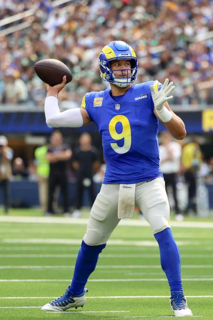 Los Angeles Rams quarterback Matthew Stafford throws during an NFL football game against the Gr ...