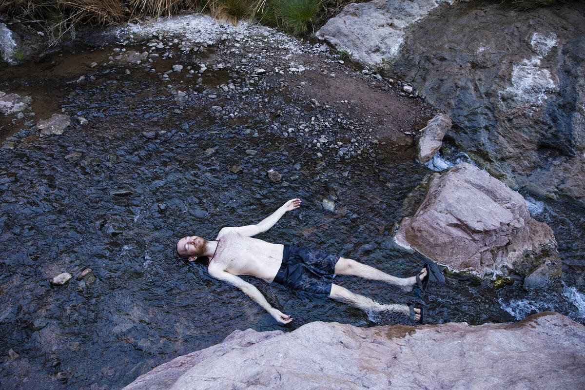 Andy Udelsman, of Las Vegas, lays in the warm waters from the Gold Strike Hot Springs along the ...