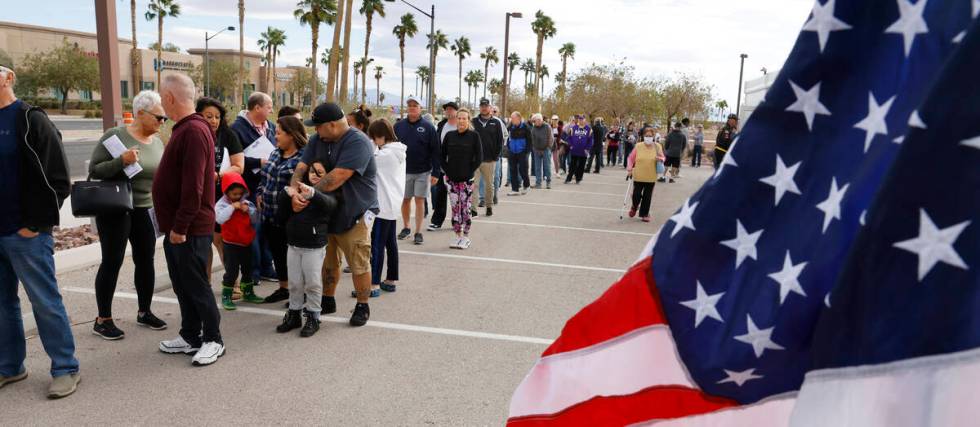 People Line up to cast their vote during early voting at Thunderbird Family Sports Complex, on ...