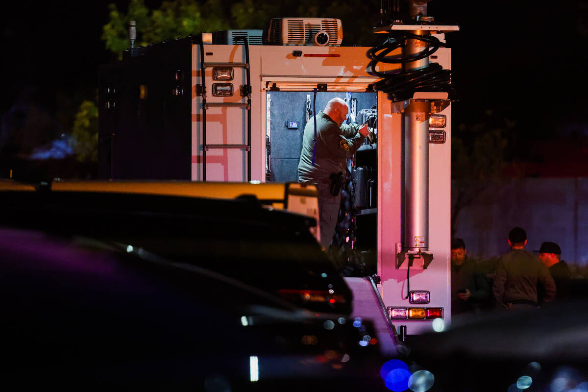 Metropolitan Police Department officers are seen on scene at an officer-involved shooting on So ...