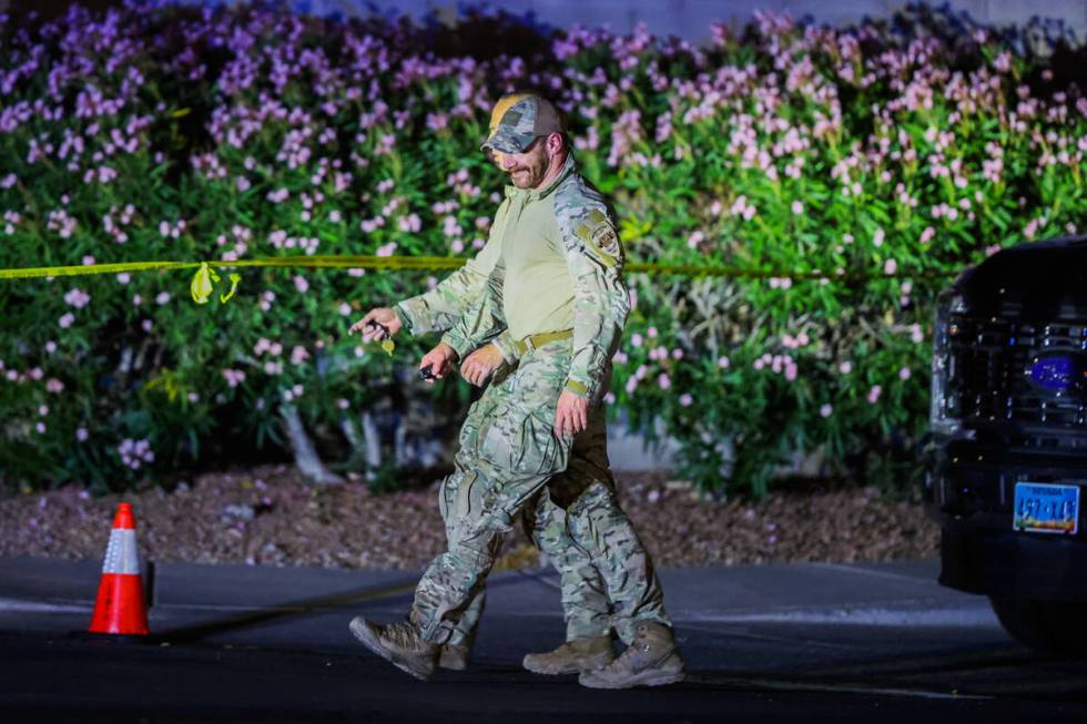 Metropolitan Police Department officers are seen on scene at an officer-involved shooting on So ...