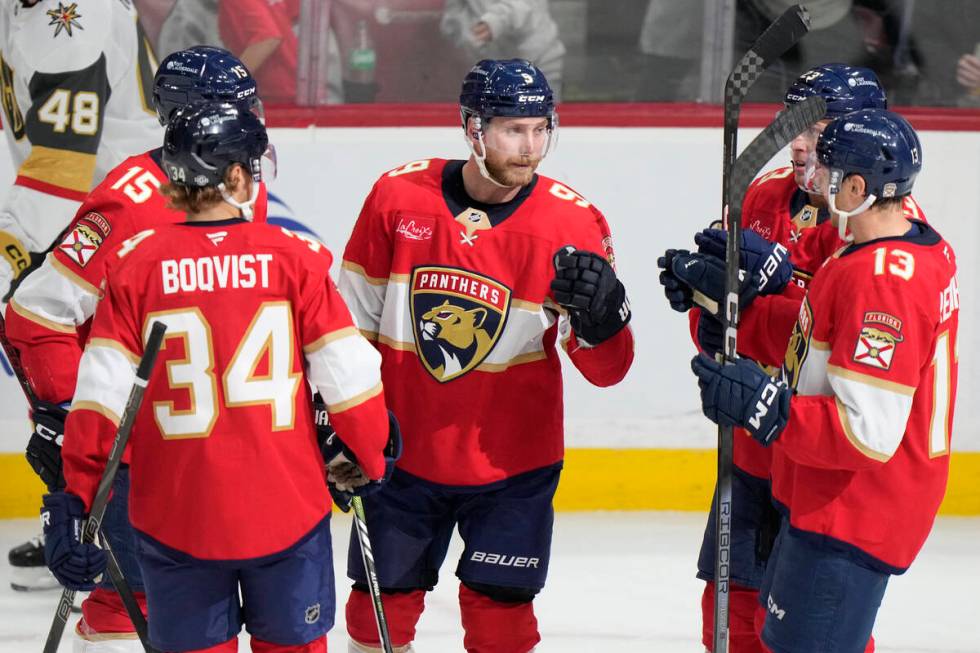 Florida Panthers center Sam Bennett (9) os congratulated by teammates after he scored during th ...