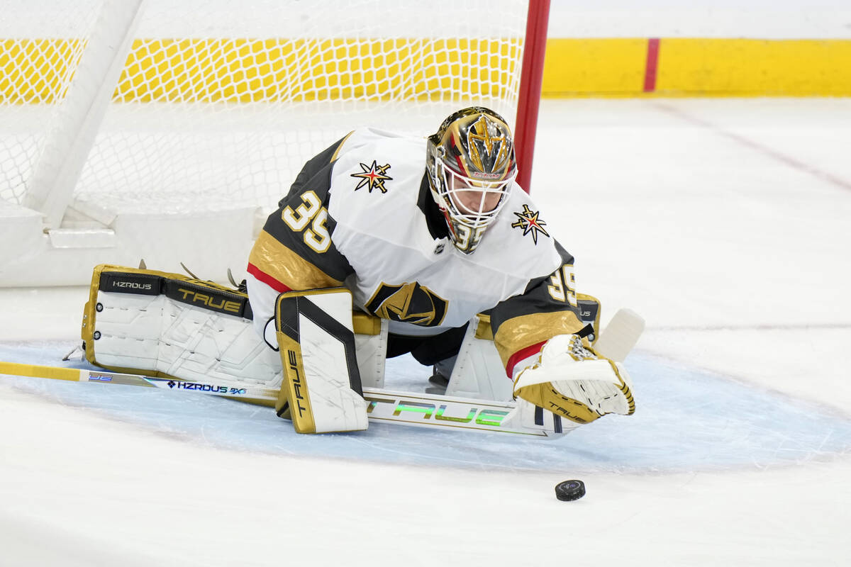 Vegas Golden Knights goaltender Ilya Samsonov stops a puck during the first period of an NHL ho ...