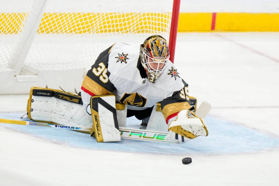 Vegas Golden Knights goaltender Ilya Samsonov stops a puck during the first period of an NHL ho ...