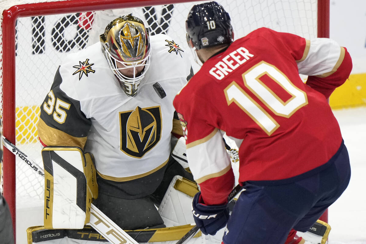 Florida Panthers left wing A.J. Greer (10) attempts a shot at Vegas Golden Knights goaltender I ...