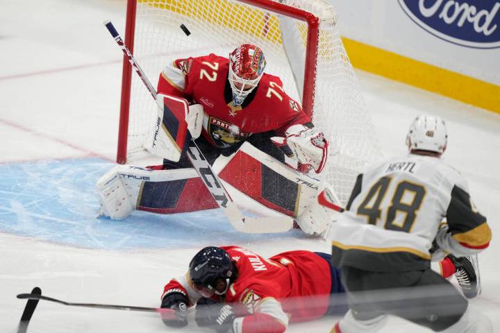 Florida Panthers goaltender Sergei Bobrovsky (72) deflects a shot from Vegas Golden Knights cen ...