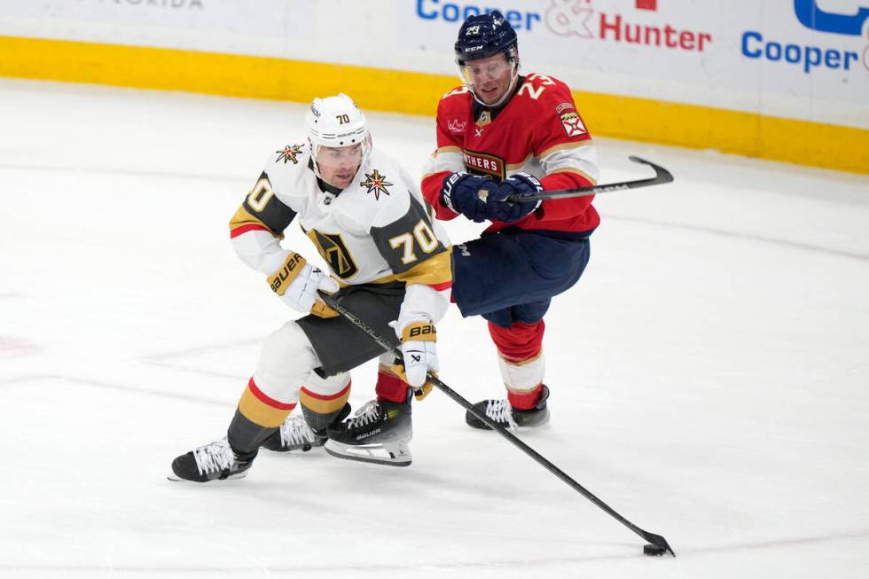 Vegas Golden Knights left wing Tanner Pearson (70) and Florida Panthers center Carter Verhaeghe ...