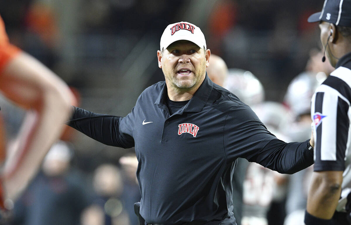 UNLV head coach Barry Odom questions a call during the second half of an NCAA college football ...