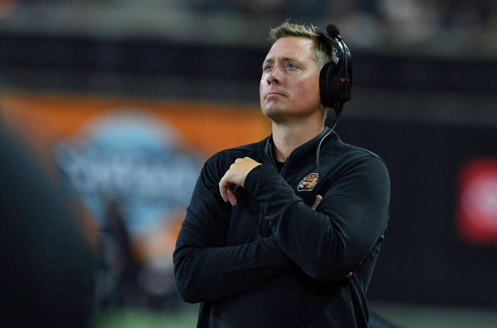 Oregon State head coach Trent Bray checks the score board while playing UNLV in the second half ...