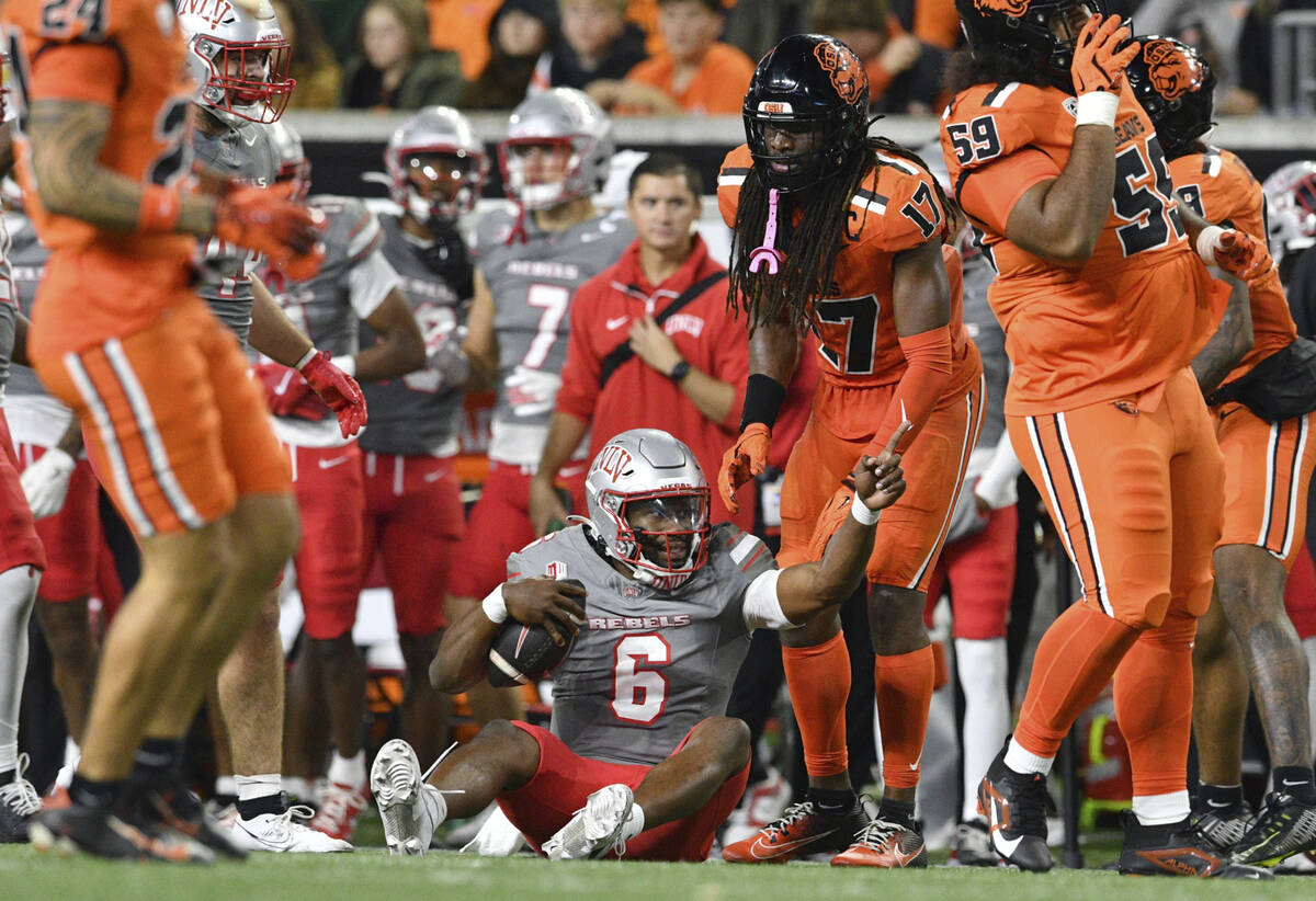 UNLV quarterback Hajj-Malik Williams (6) celebrates a fourth quarter first down during the seco ...