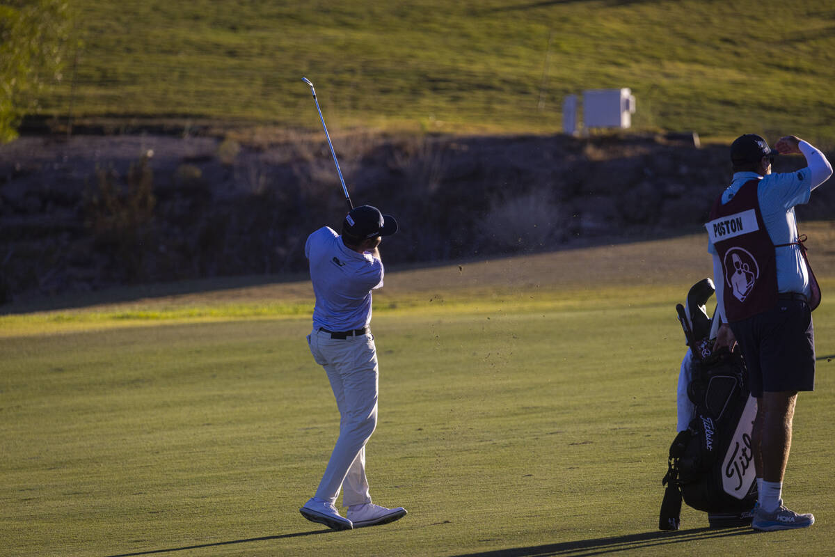 J.T. Poston hits a fairway shot at the 18th hole during the final round of the Shriners Childre ...