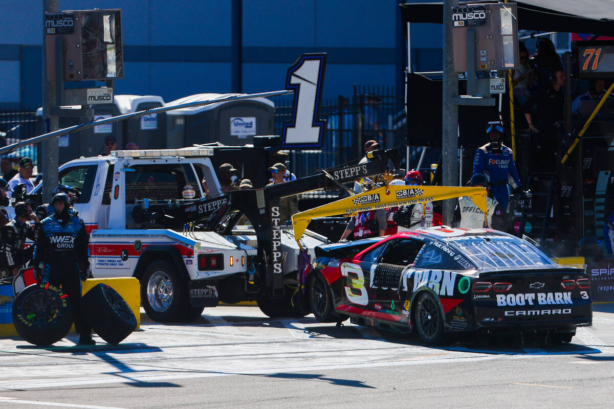 NASCAR driver Austin Dillon’s car is wheeled off the track after a crash during the Sout ...