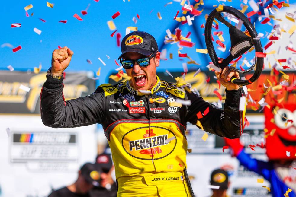 Joey Logano celebrates winning the South Point 400 NASCAR Cup Series race at the Las Vegas Moto ...