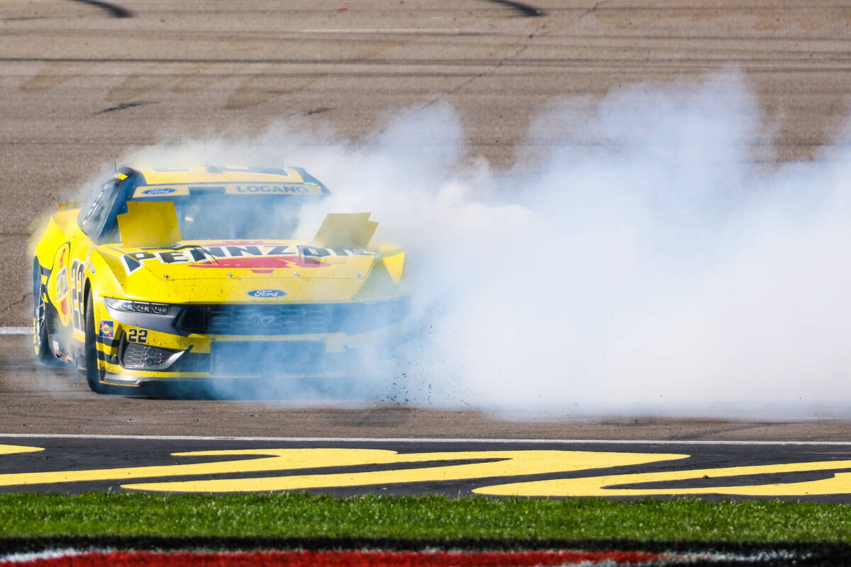 NASCAR driver Joey Logano celebrates winning the South Point 400 NASCAR Cup Series race at the ...