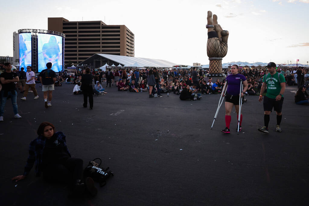 Festival attendees walk the grounds during the When We Were Young music festival at the Las Veg ...