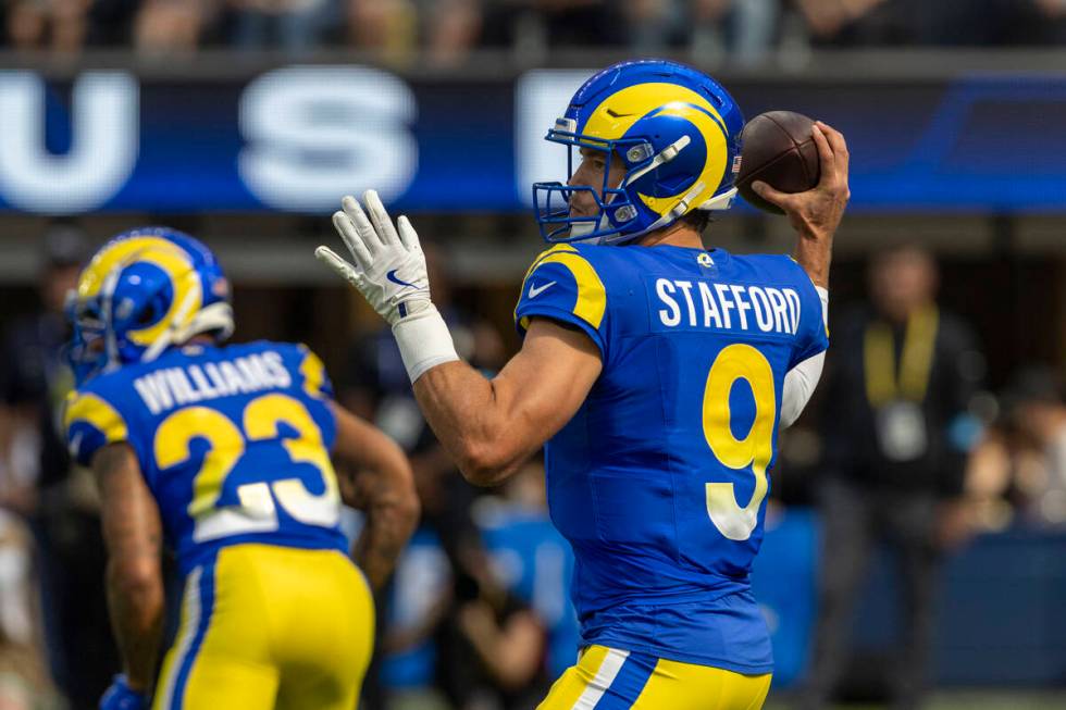 Los Angeles Rams quarterback Matthew Stafford (9) throws against the Raiders during the first h ...