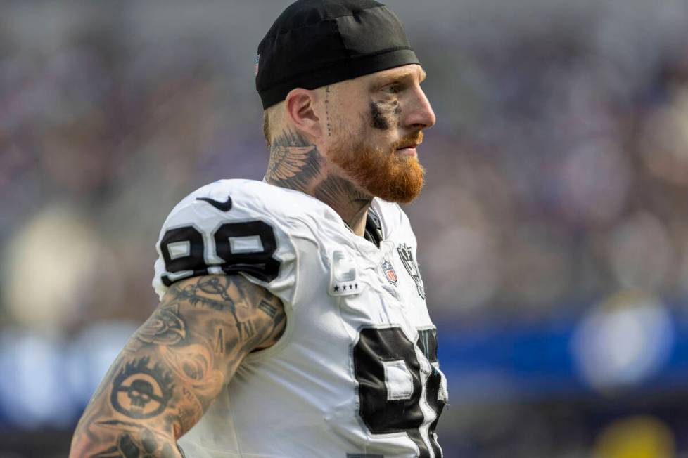 Raiders defensive end Maxx Crosby (98) looks on from the sideline during the second half of an ...