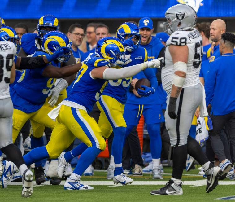 Raiders guard Jackson Powers-Johnson (58) walks past the Los Angeles Rams sideline after Rams s ...