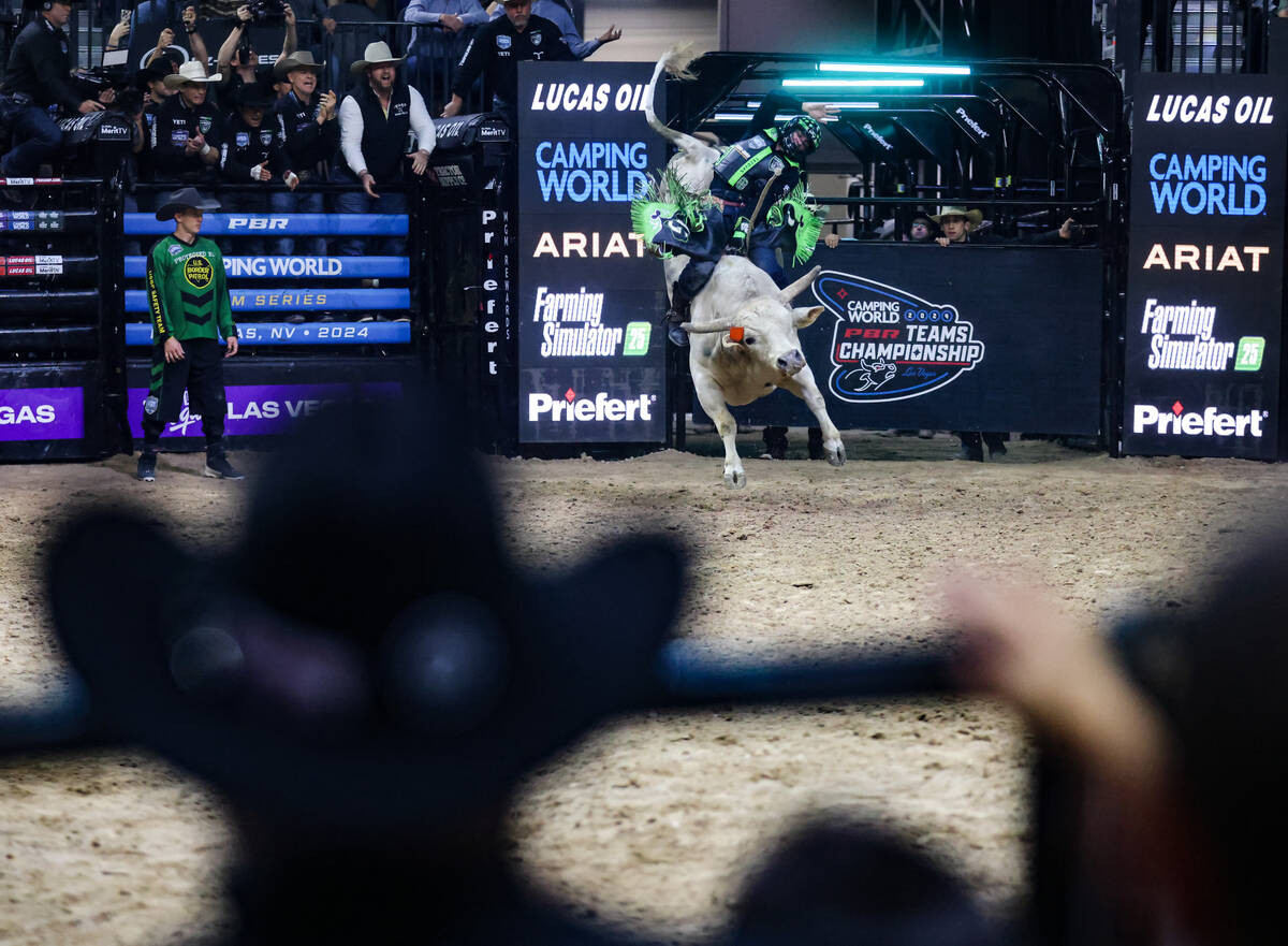 Austin Gamblers’ Jose Vitor Leme rides a bull at the Professional Bull Riders Teams Cham ...