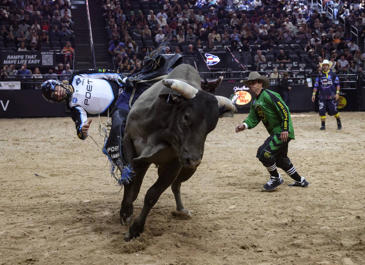 Carolina Cowboys’ Derek Kolbaba rides a bull at the Professional Bull Riders Teams Champ ...