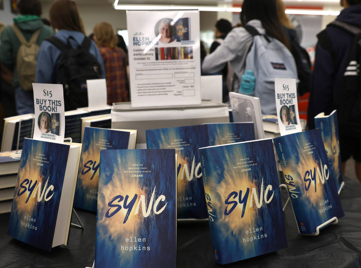 Ellen Hopkins', a banned author, books titled "Sync" are displayed at Arbor View High ...