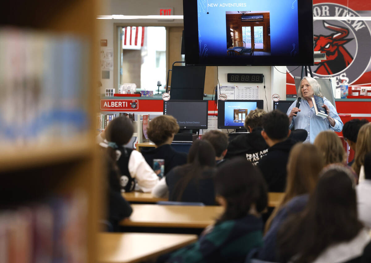 Ellen Hopkins, a banned author, speaks at Arbor View High School library, on Monday, Oct. 21, 2 ...