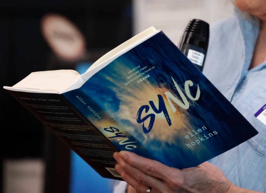 Ellen Hopkins, a banned author, reads from her book titled "Sync" at Arbor View High ...