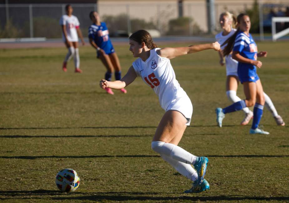 Coronado defender Jovie Poniewaz (15) kicks the ball during a soccer game at Bishop Gorman High ...