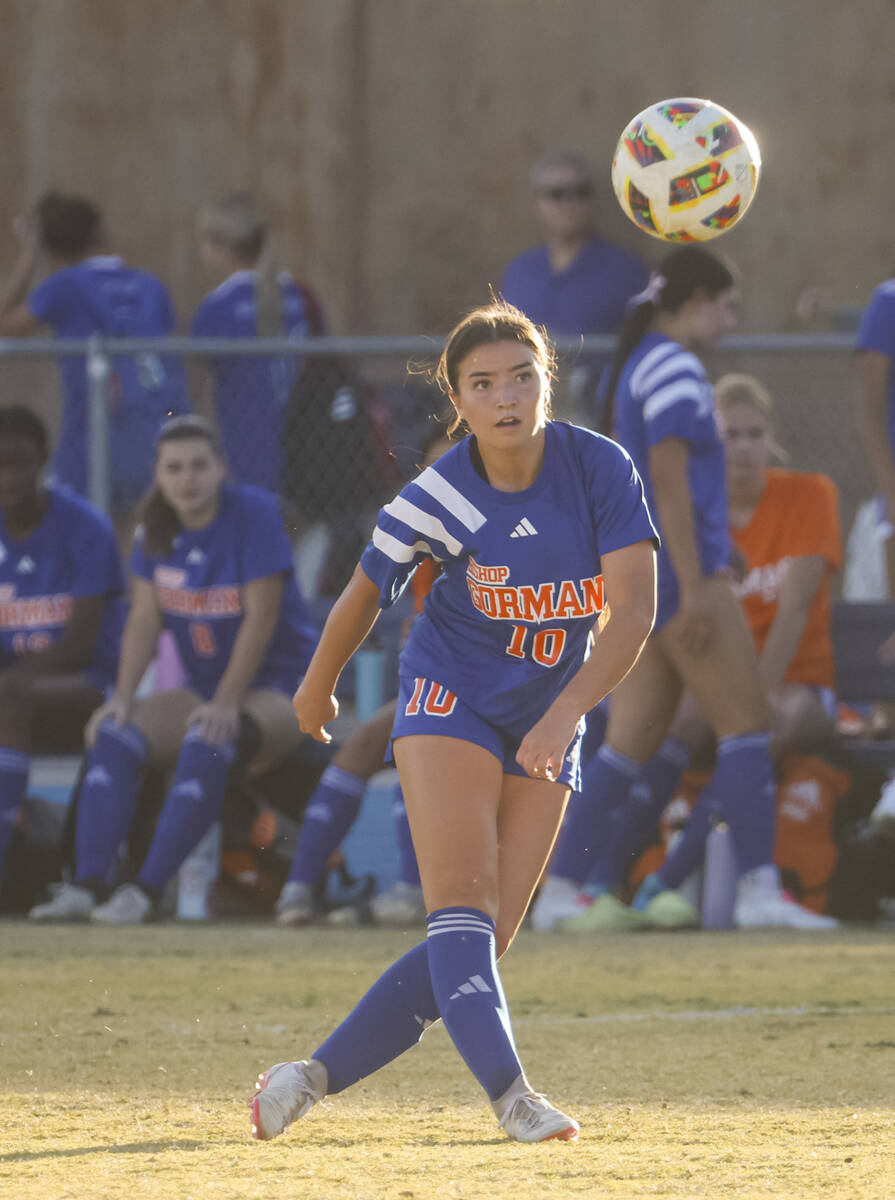 Bishop Gorman midfielder Stephenie Hackett (10) kicks the ball while playing against Coronado d ...