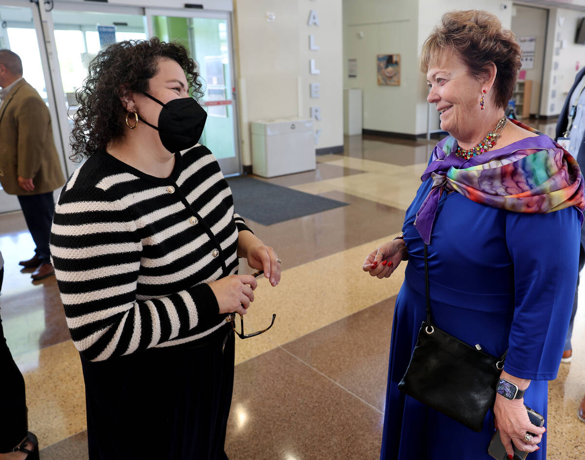 Clark County School Board President Evelyn Garcia Morales, left, visits with Heard Elementary S ...