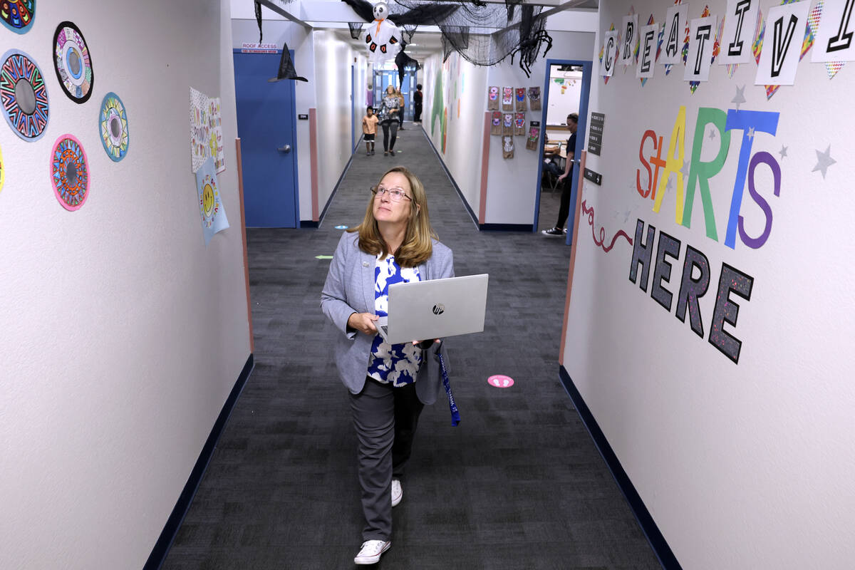 Lee Antonello Elementary School Principal Kathi Rozek walks in a hallway at the Las Vegas schoo ...