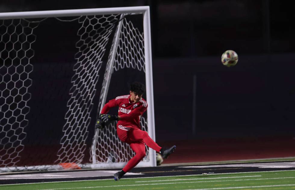 Coronado goalkeeper Logan Pierce kicks the ball during a soccer game at Palo Verde High School ...