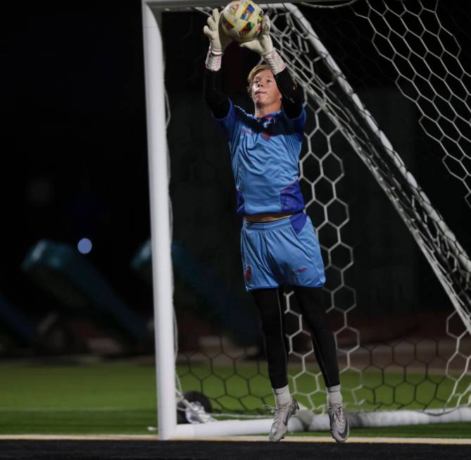 Palo Verde goalkeeper Landon Blanchard stops a shot from Coronado during a soccer game at Palo ...