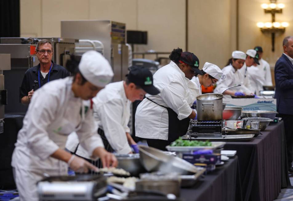 Local high school students compete in the School Meal Cooking Challenge at the Healthy Meals Su ...