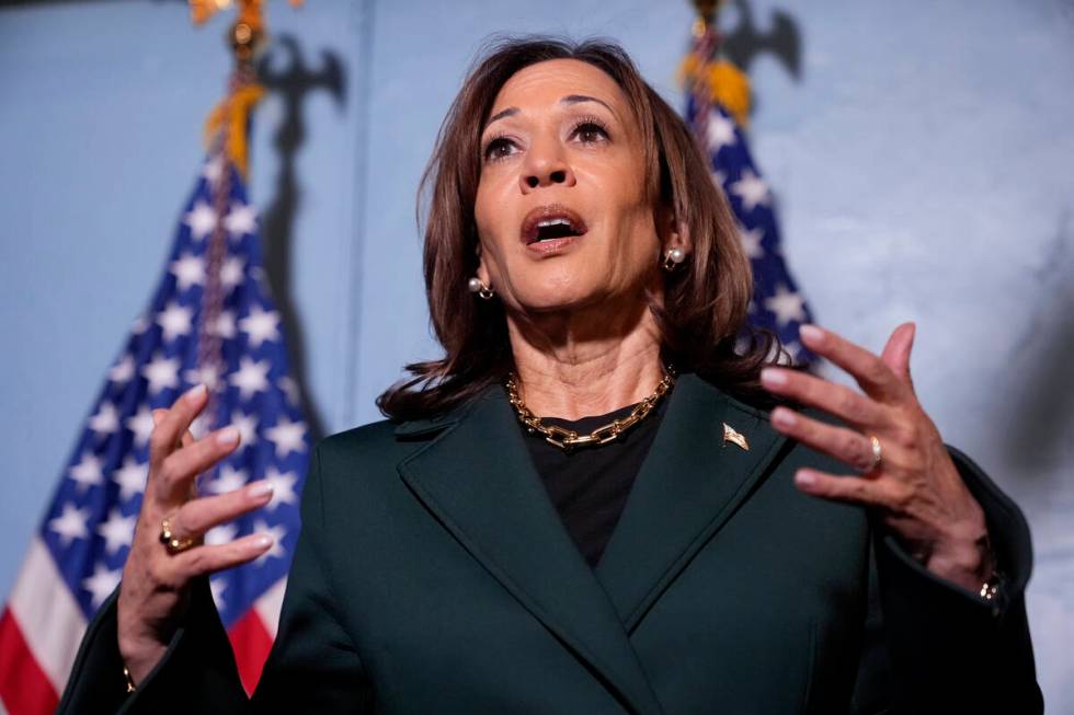 Democratic presidential nominee Vice President Kamala Harris speaks with reporters before a tow ...