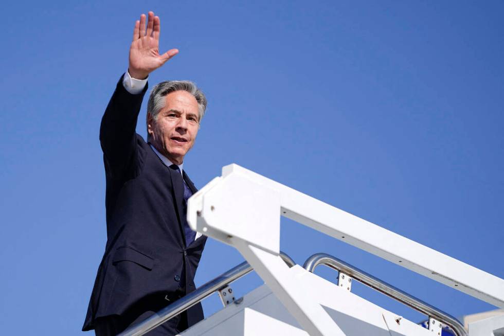 U.S. Secretary of State Antony Blinken boards a plane as he departs Joint Base Andrews, Marylan ...