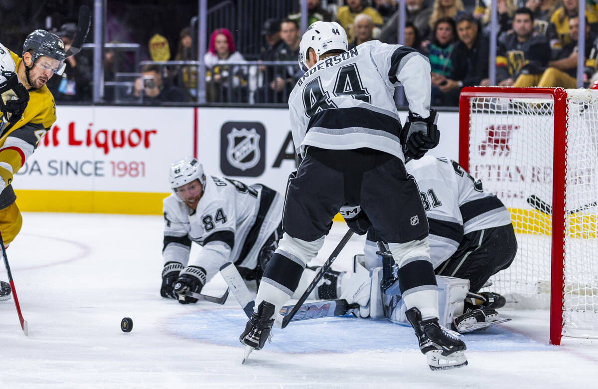 Golden Knights center Tomas Hertl (48) sends a puck headed towards Los Angeles Kings goaltender ...