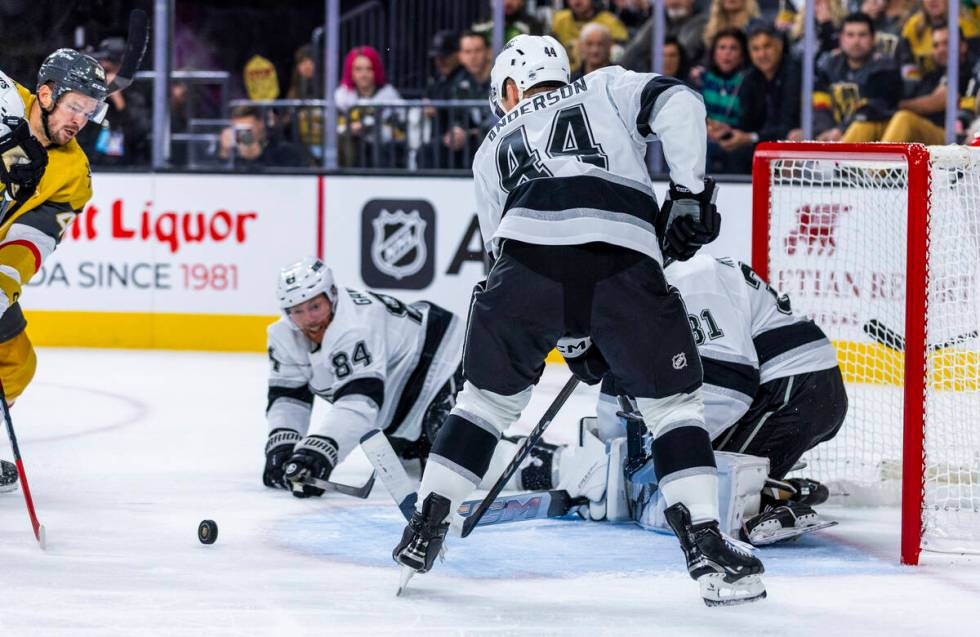 Golden Knights center Tomas Hertl (48) sends a puck headed towards Los Angeles Kings goaltender ...