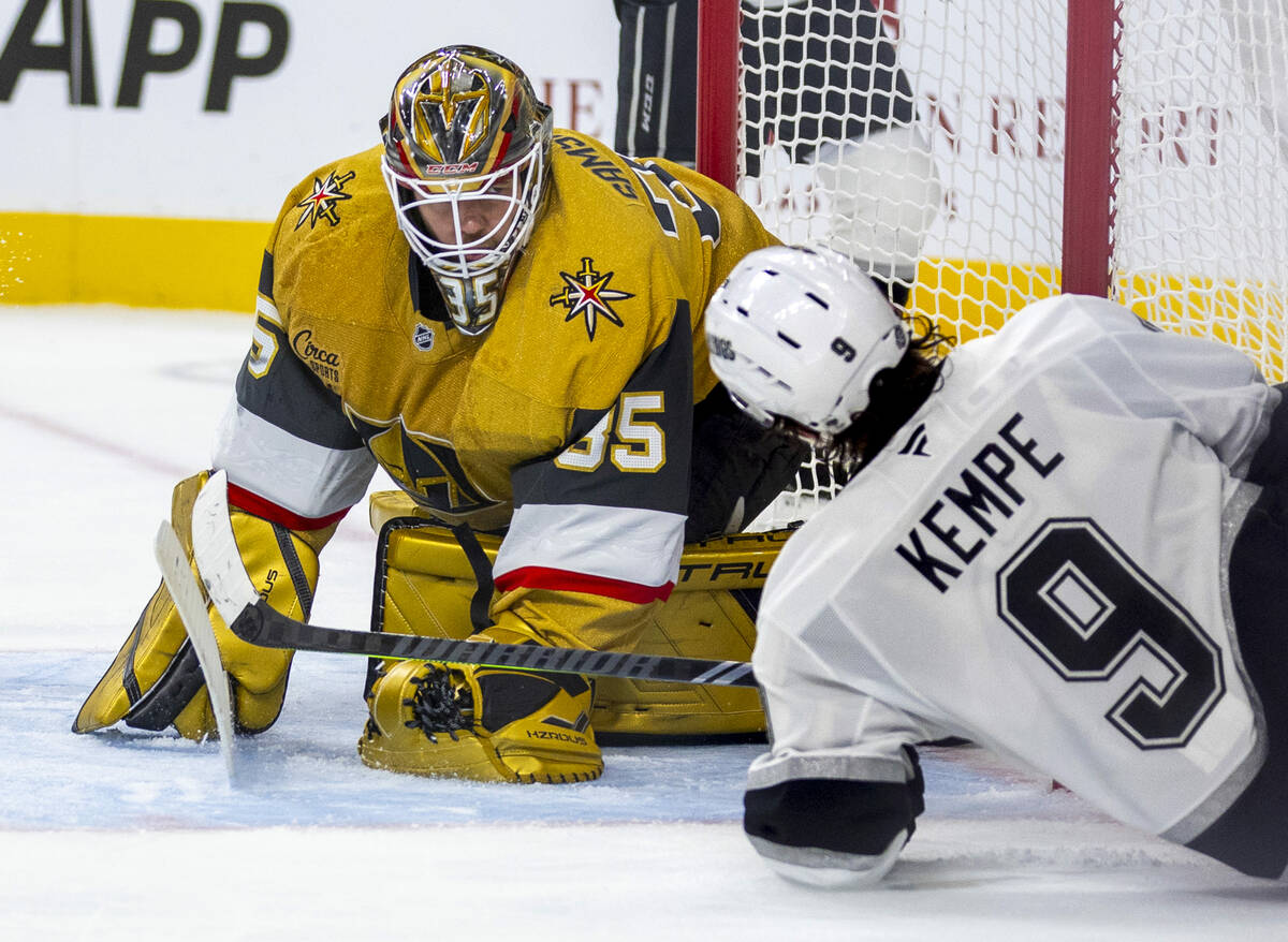 Golden Knights goaltender Ilya Samsonov (35) smothers another shot in close by Los Angeles King ...