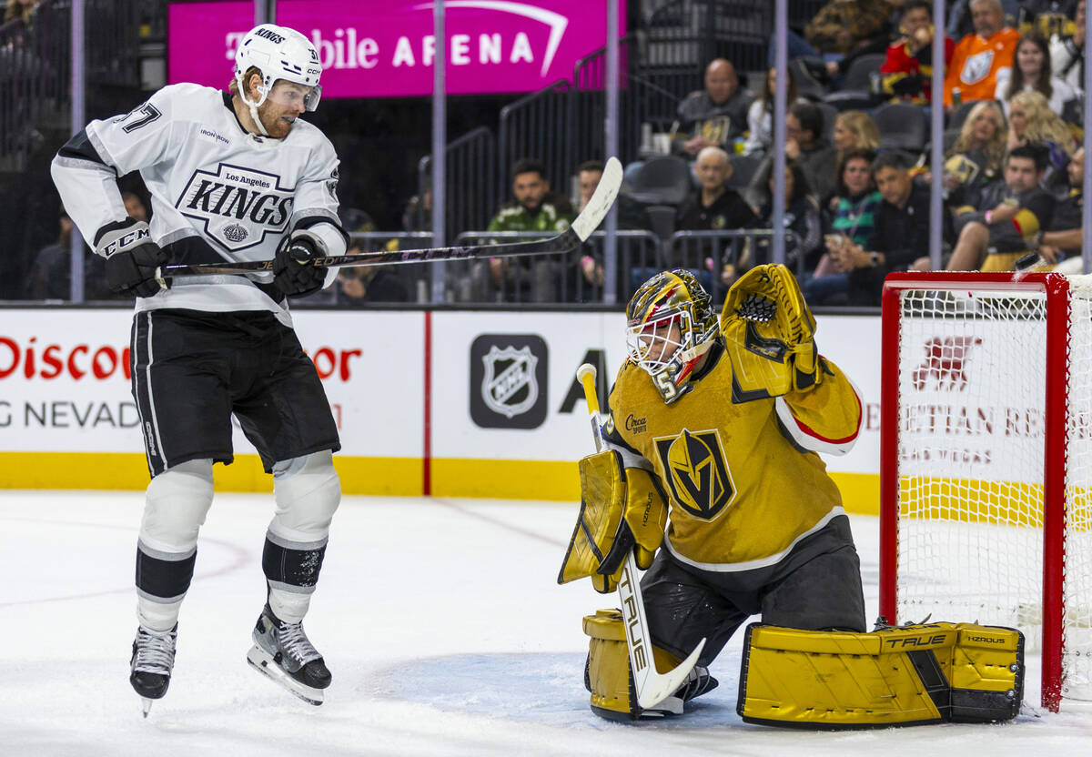 Los Angeles Kings left wing Warren Foegele (37) and Golden Knights goaltender Ilya Samsonov (35 ...