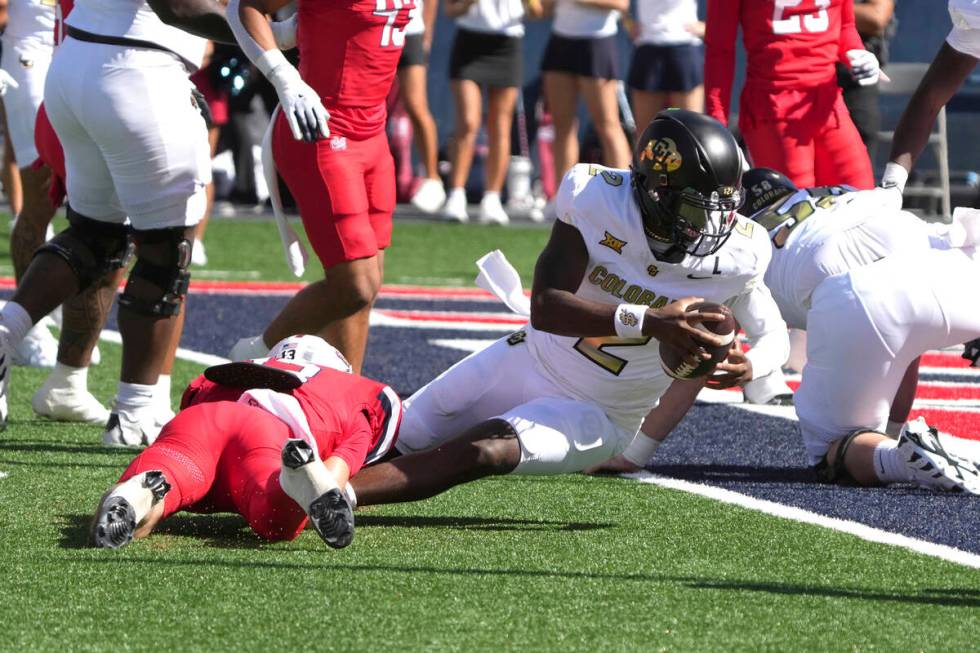 Colorado quarterback Shedeur Sanders (2) in the first half during an NCAA college football game ...