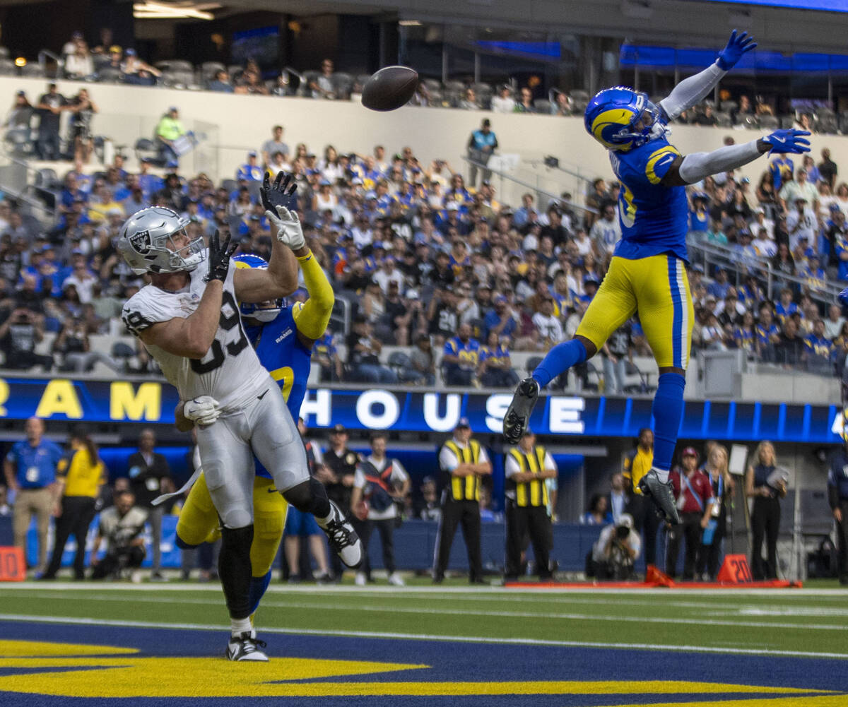 Los Angeles Rams safety Kamren Curl (3) leaps to try to break up a pass intended for Raiders ti ...