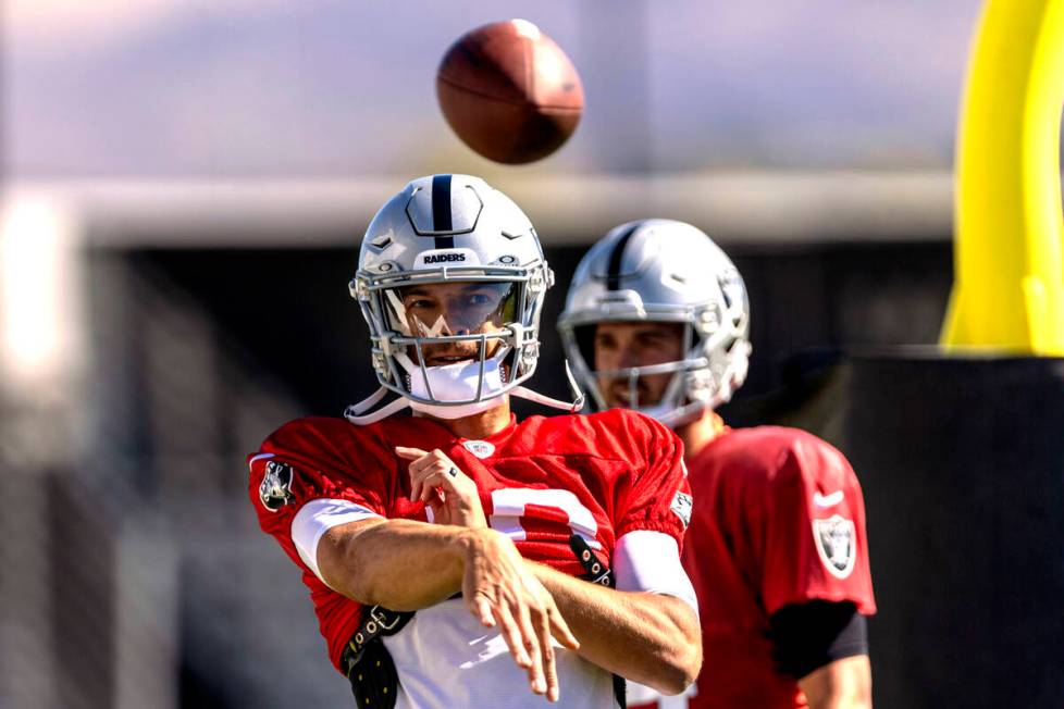 Raiders quarterback Desmond Ridder (10) throws the football during team practice at the Intermo ...