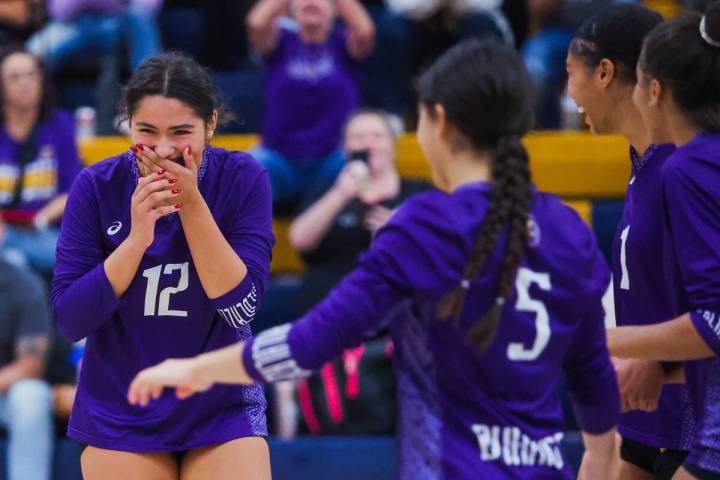 Durango outside hitter Angelina Guerrero (12) giggles after earning her team a point during a v ...