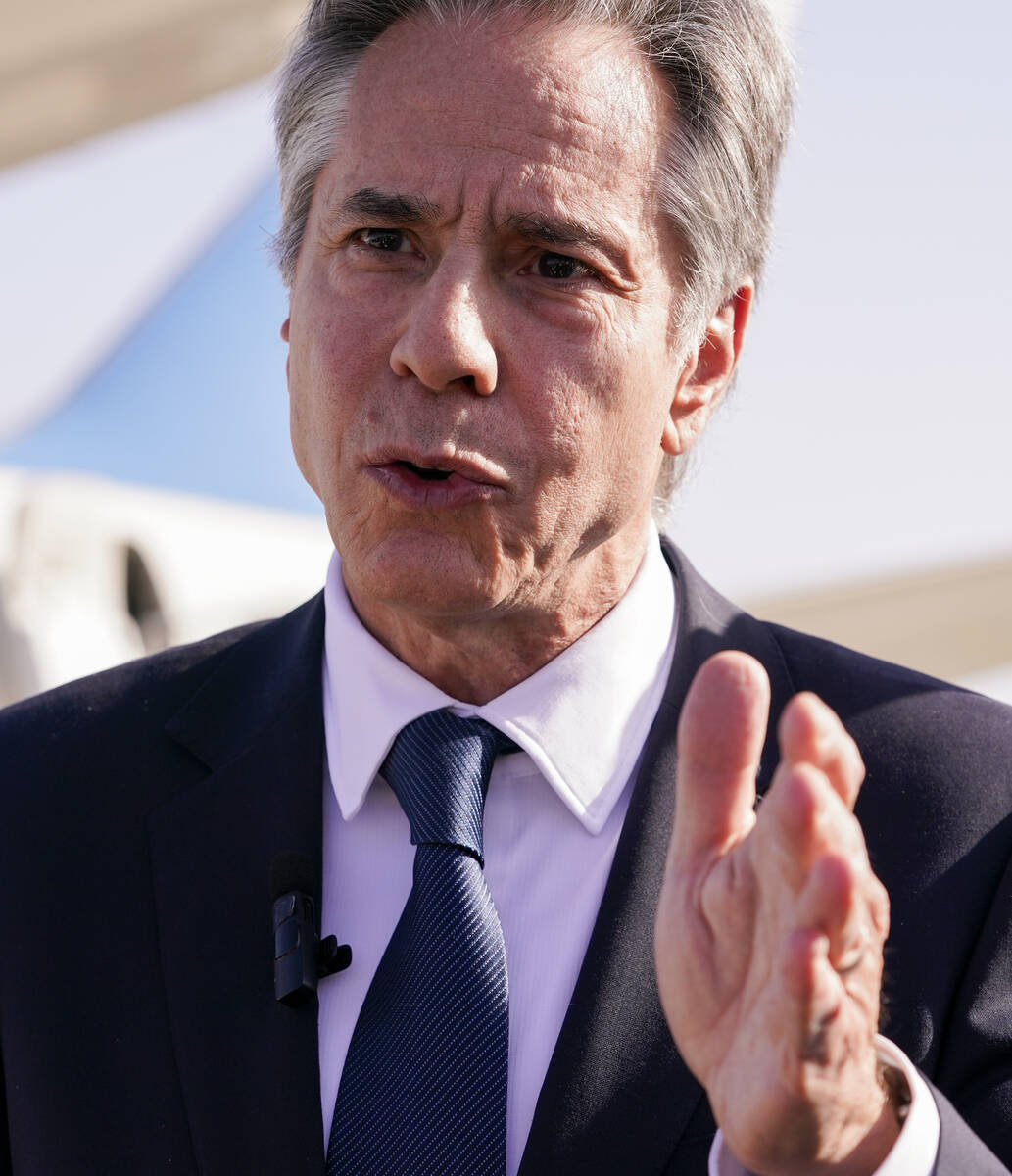 U.S. Secretary of State Antony Blinken speaks with members of the media as he arrives at Ben Gu ...