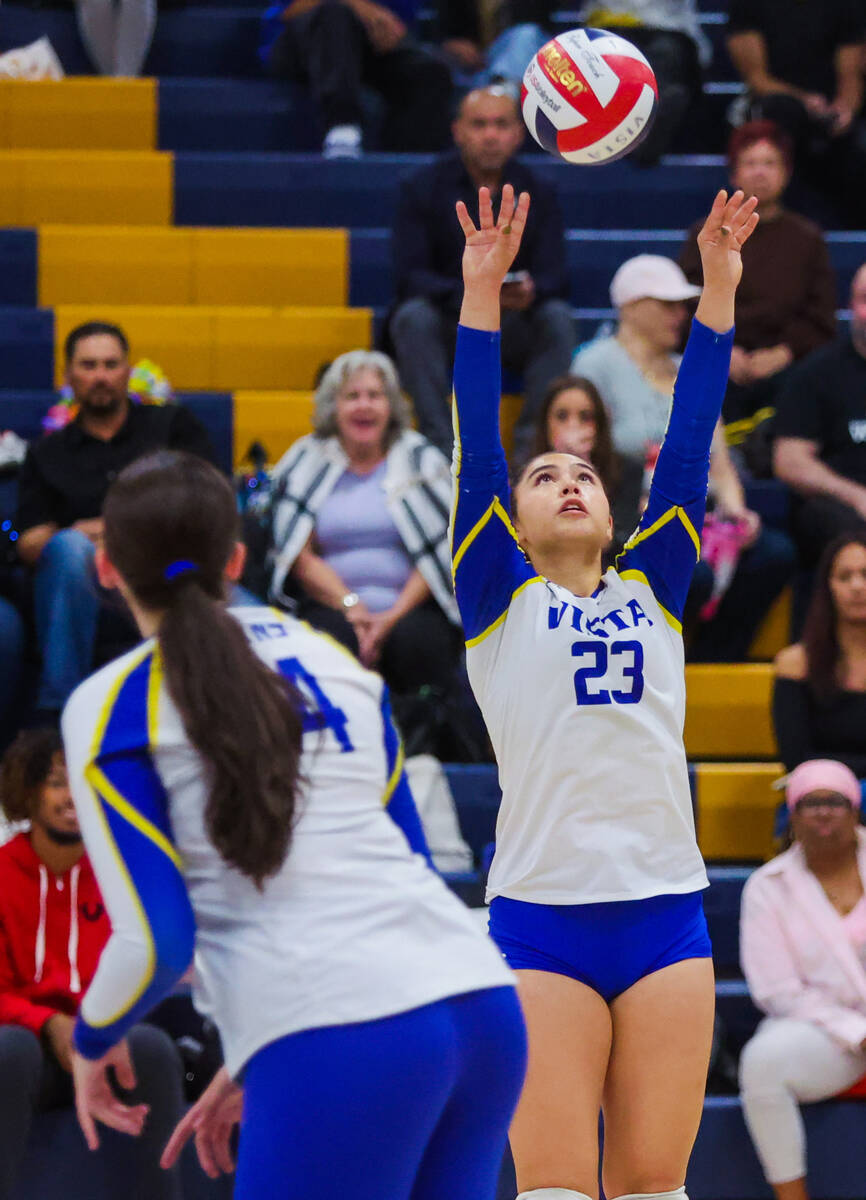 Sierra Vista setter Angelina DeGrange (23) reaches to bump the ball during a volleyball match b ...