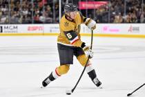 Vegas Golden Knights defenseman Kaedan Korczak (6) shoots against the Los Angeles Kings during ...